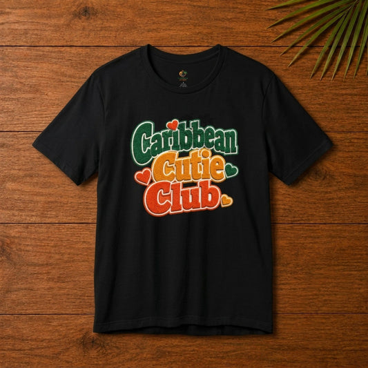 Youth shirt with Caribbean Cutie Club graphic in colorful retro lettering and heart accents.
