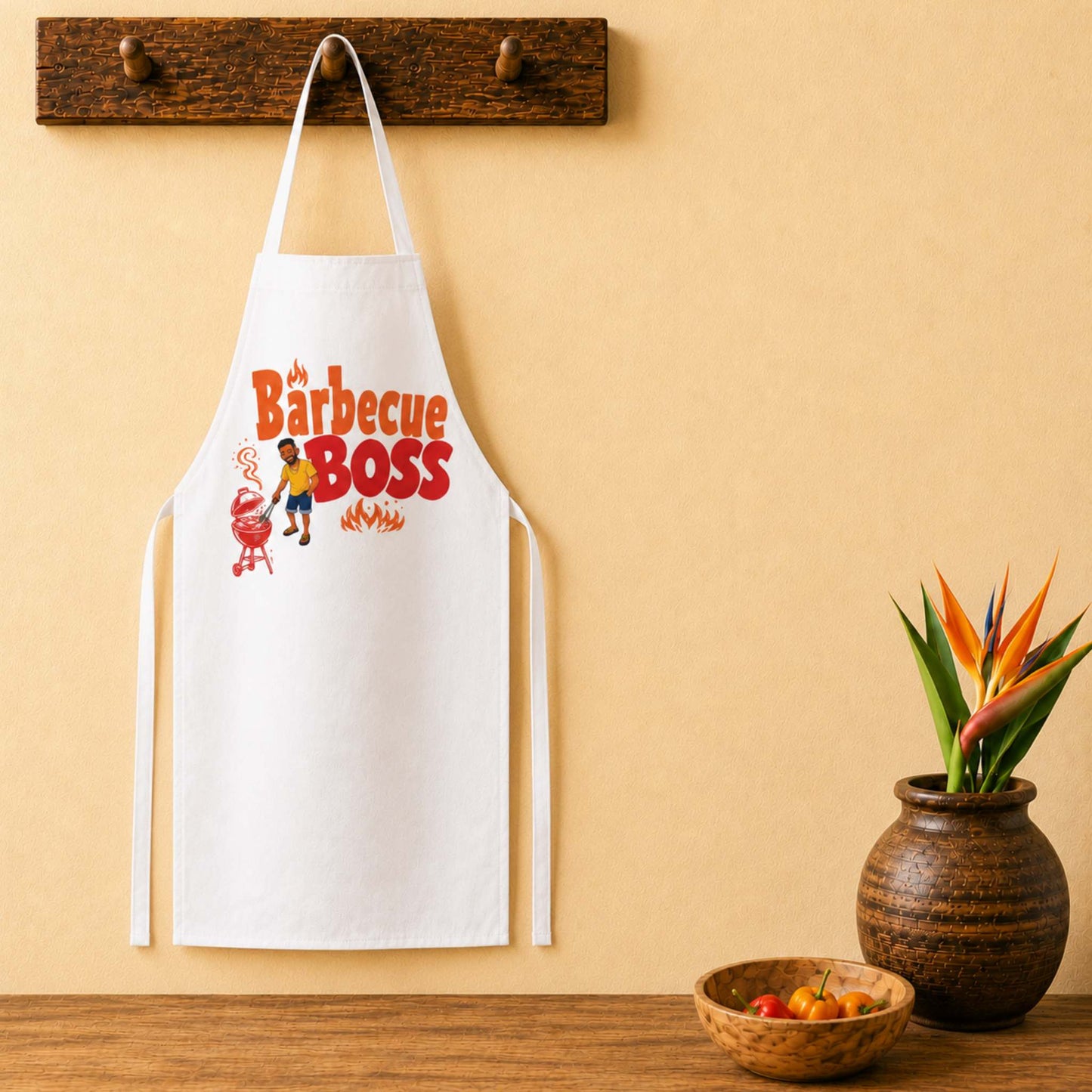 Barbecue Boss Caribbean apron with playful BBQ graphic for grill masters and cookout lovers.