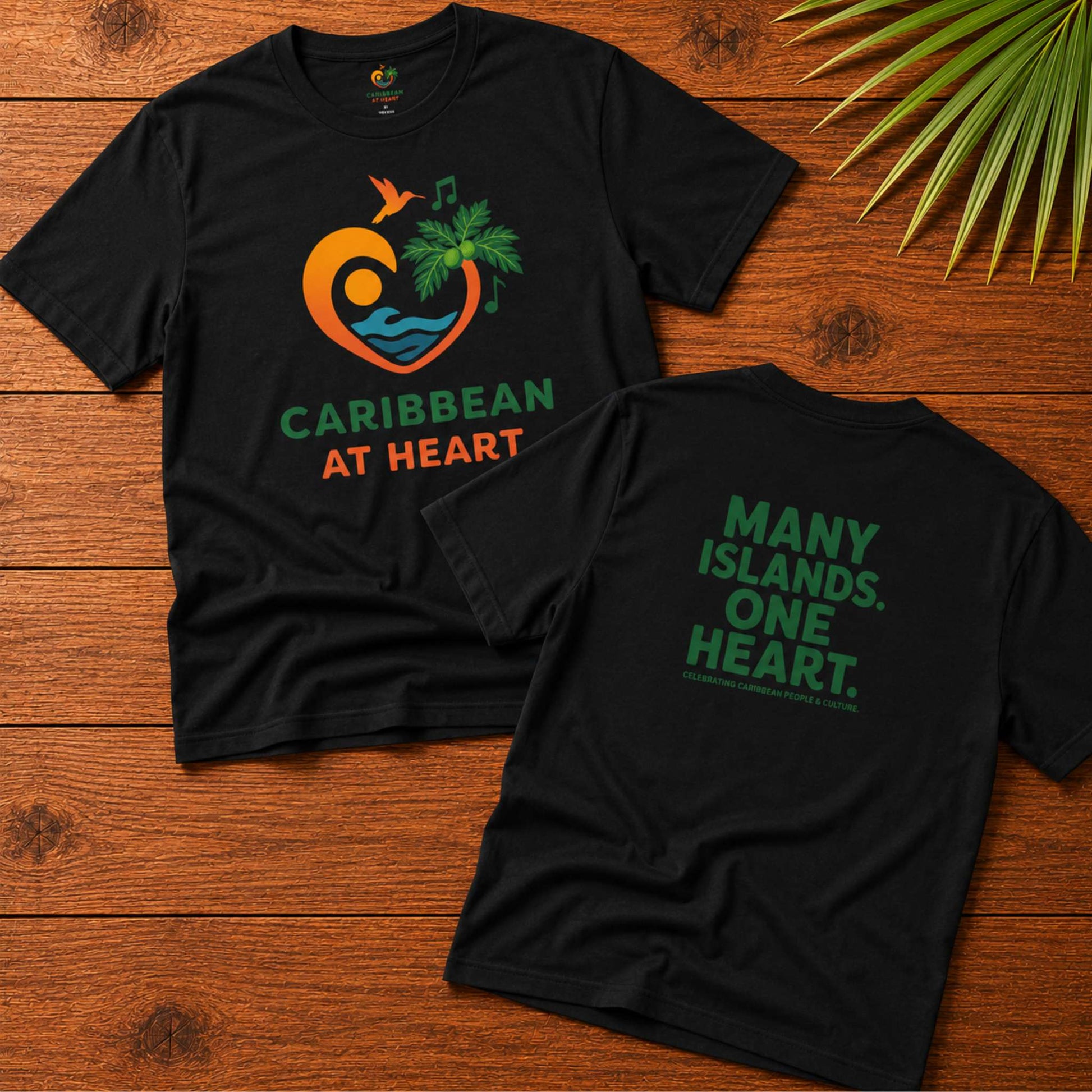 Youth unisex Caribbean graphic t-shirt featuring the Caribbean At Heart logo on the front and Many Islands One Heart artwork on the back.