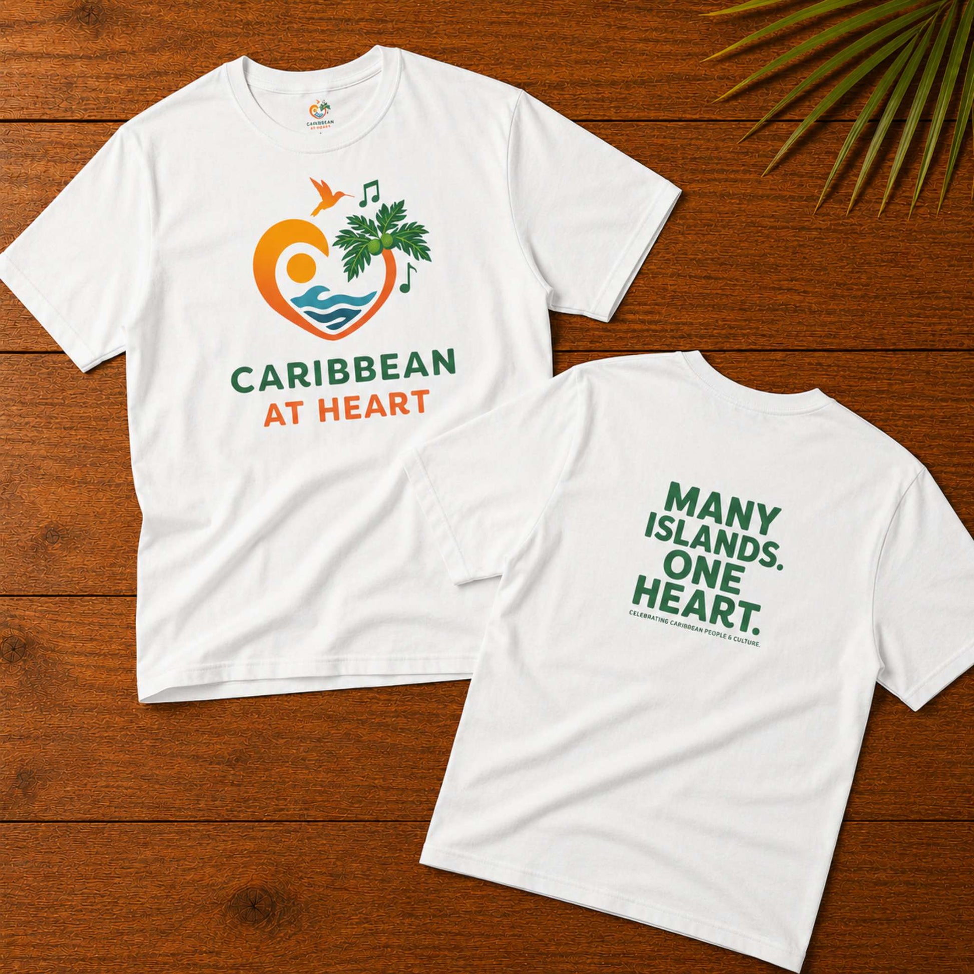 Youth unisex Caribbean graphic t-shirt featuring the Caribbean At Heart logo on the front and Many Islands One Heart artwork on the back.