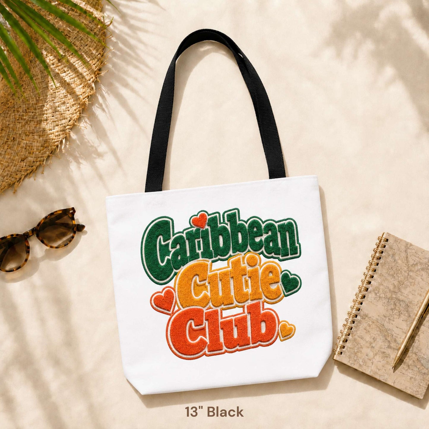 Caribbean Cutie Club tote bag with colorful retro lettering and heart details.