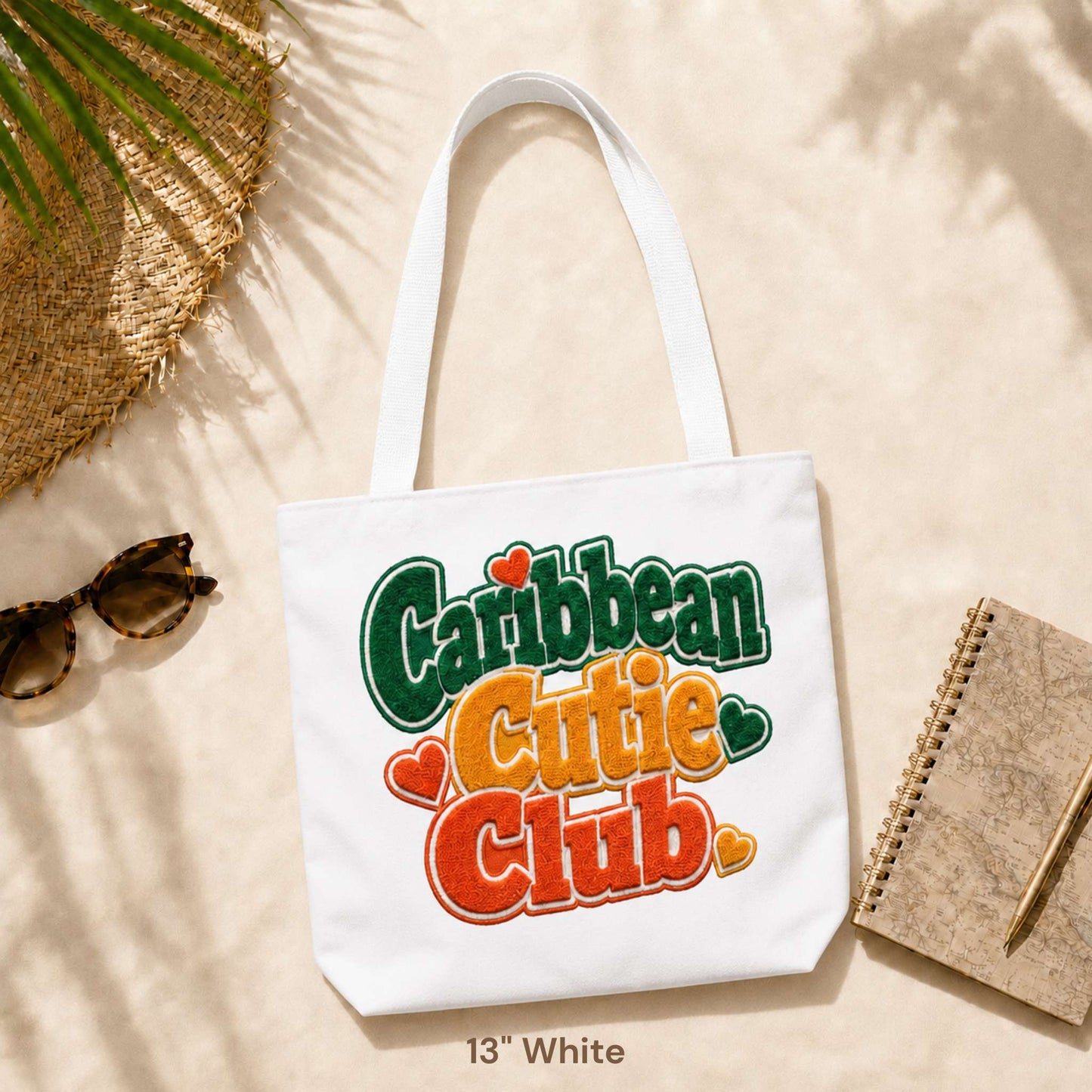 Caribbean Cutie Club tote bag with colorful retro lettering and heart details.