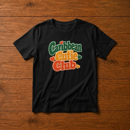 Youth shirt with Caribbean Cutie Club graphic in colorful retro lettering and heart accents.