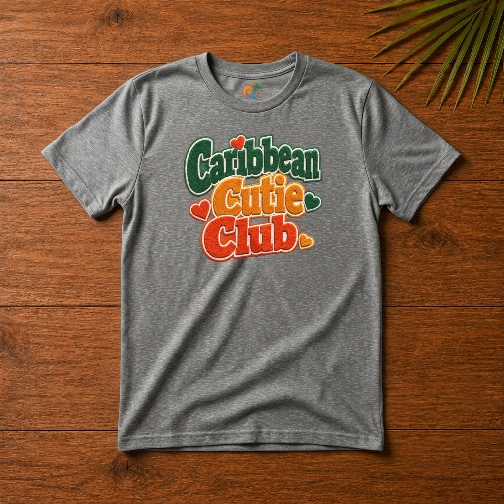 Youth shirt with Caribbean Cutie Club graphic in colorful retro lettering and heart accents.