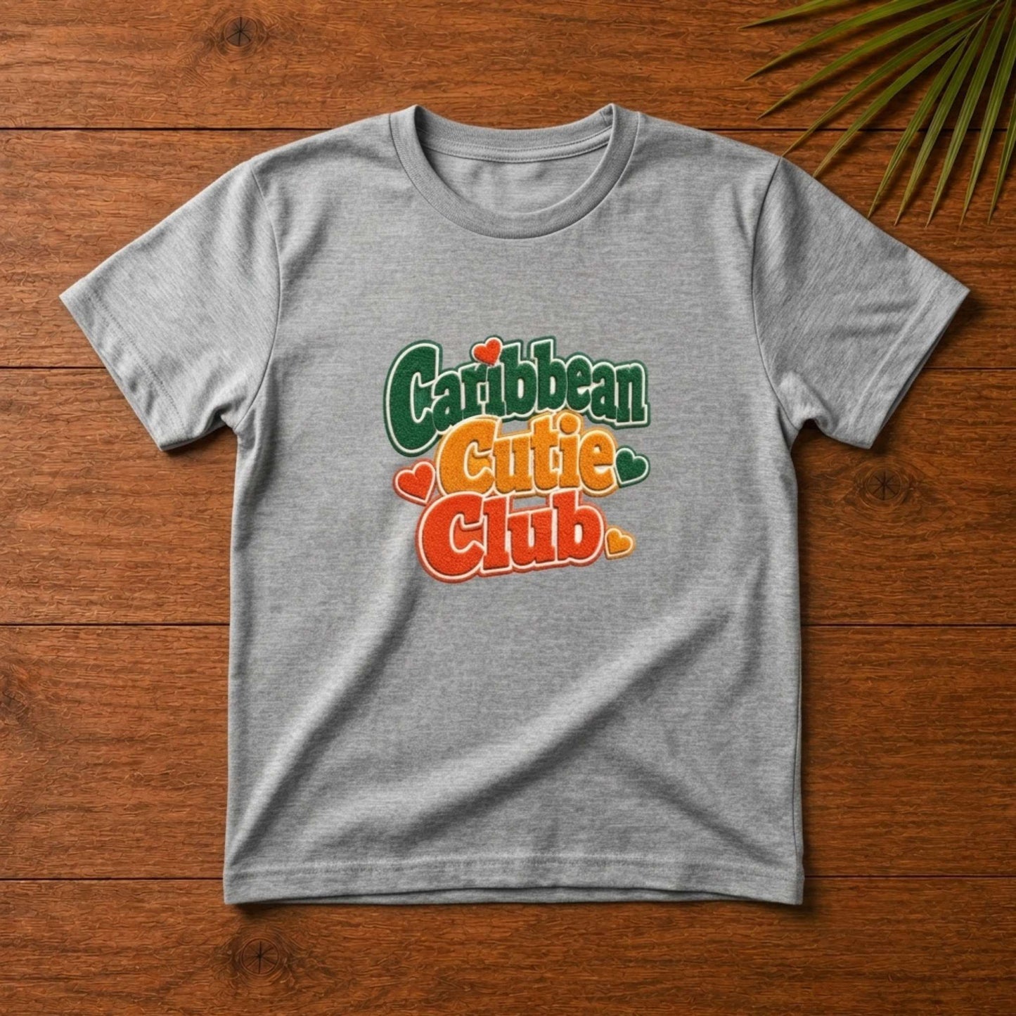 Toddler shirt with playful Caribbean Cutie Club design and heart details for matching family outfits.