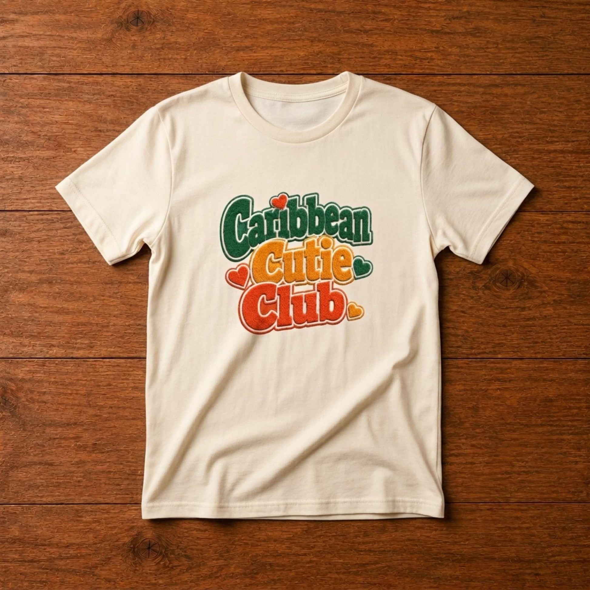 Toddler shirt with playful Caribbean Cutie Club design and heart details for matching family outfits.