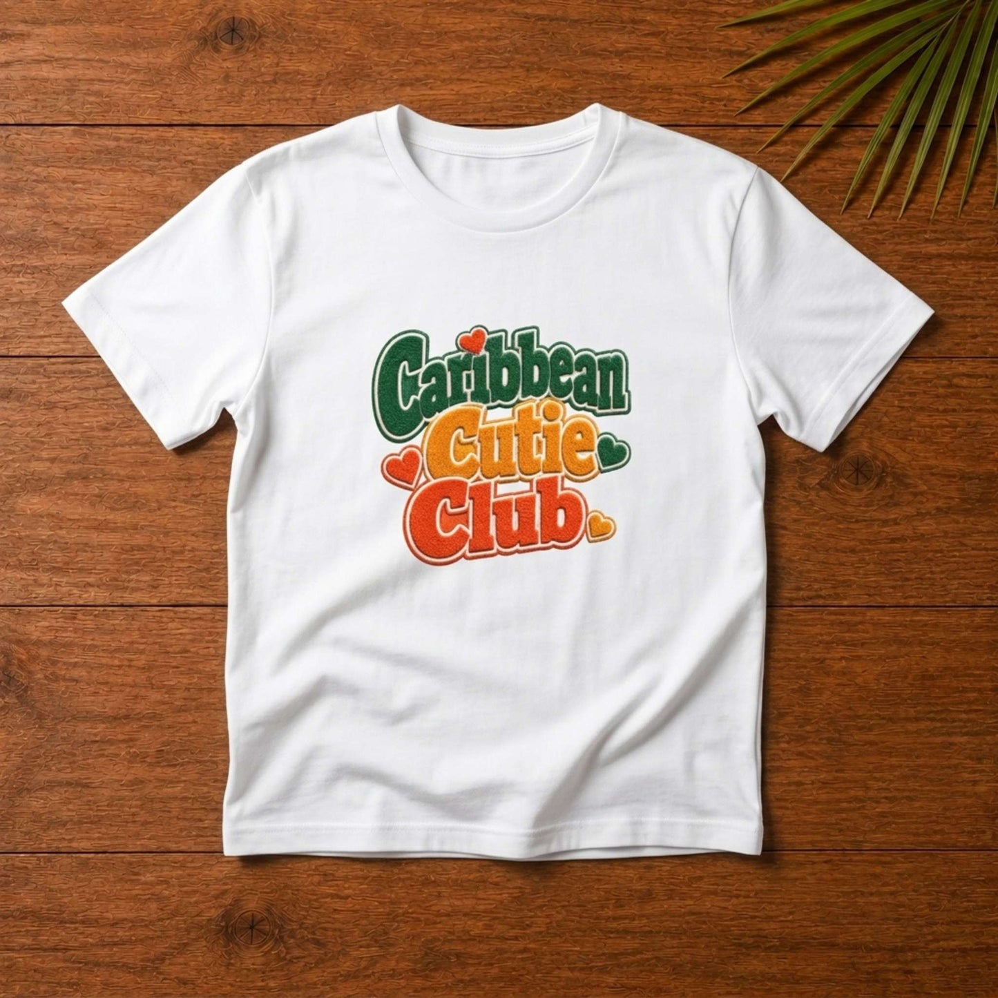 Toddler shirt with playful Caribbean Cutie Club design and heart details for matching family outfits.