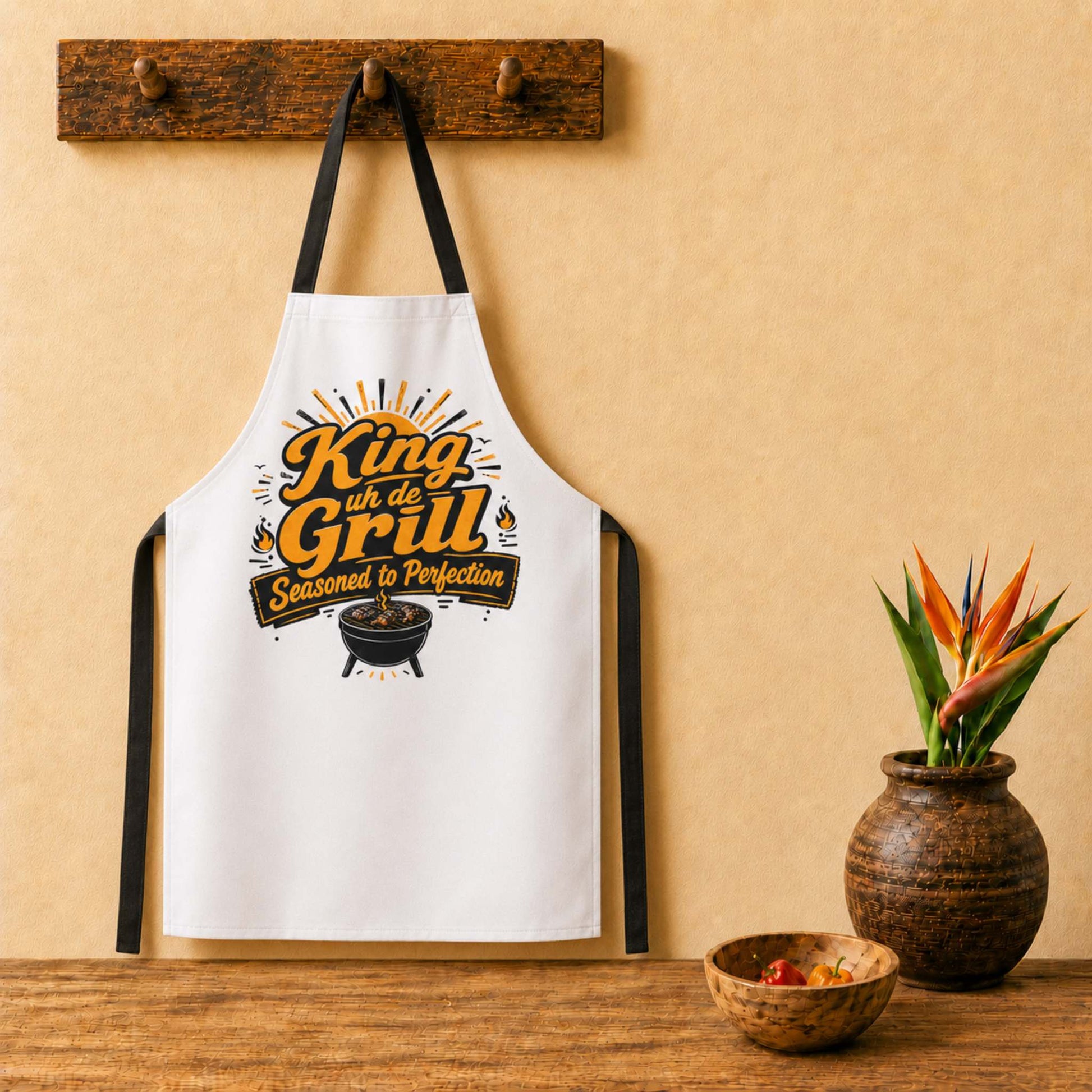 King uh de Grill Caribbean apron with bold BBQ grill master graphic