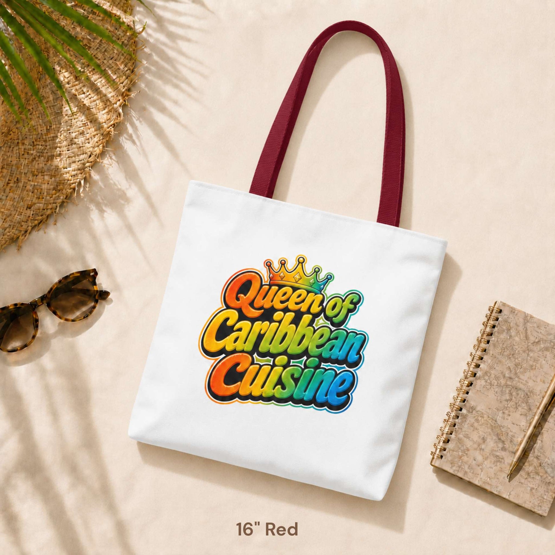Queen of Caribbean Cuisine tote bag with colorful crown graphic and red shoulder handles, available in three sizes.