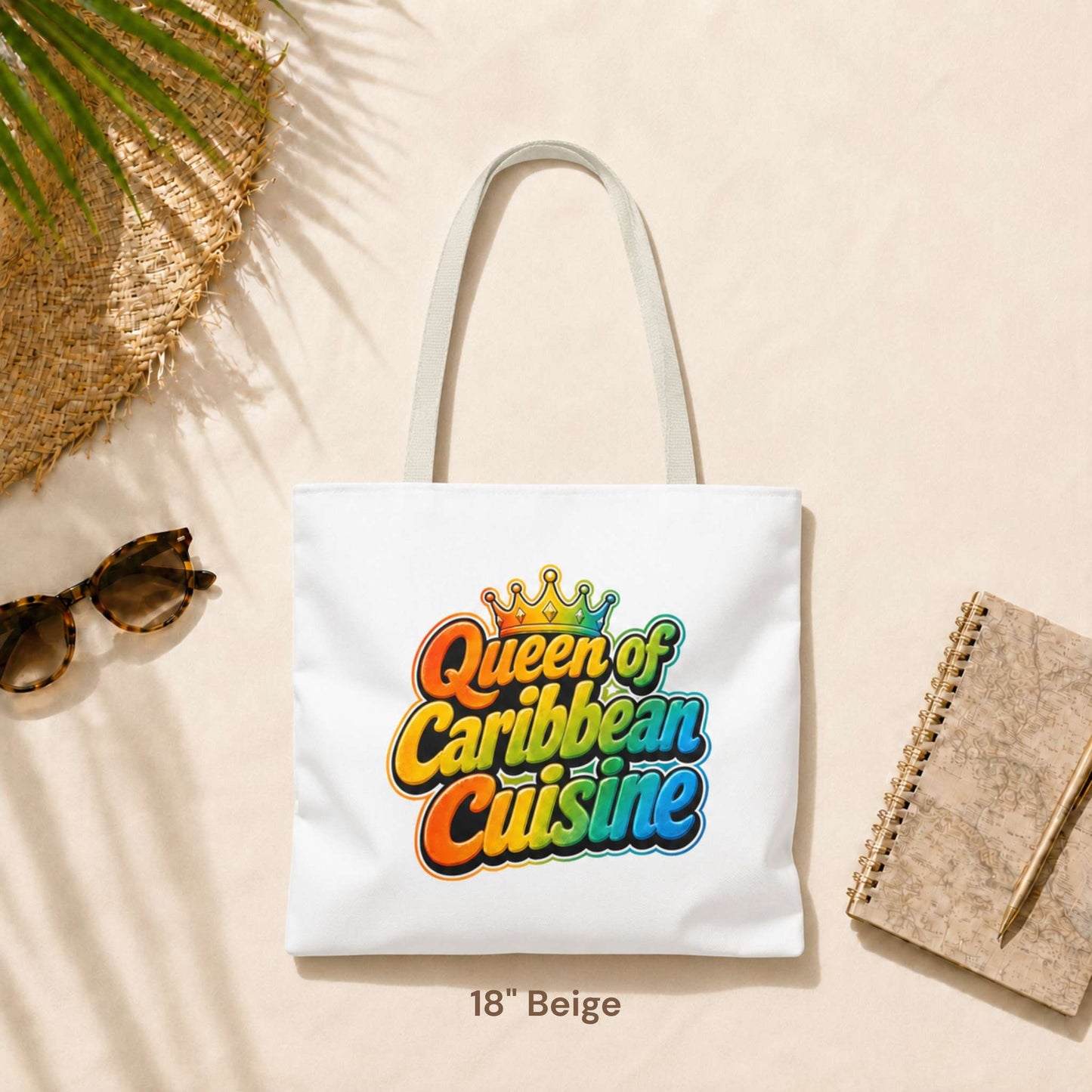 Queen of Caribbean Cuisine tote bag with colorful crown graphic and beige shoulder handles, available in three sizes.