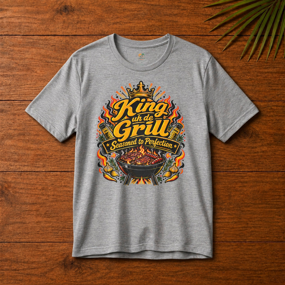 King uh de Grill Adult T-Shirt in athletic heather with Seasoned to Perfection grill graphic.