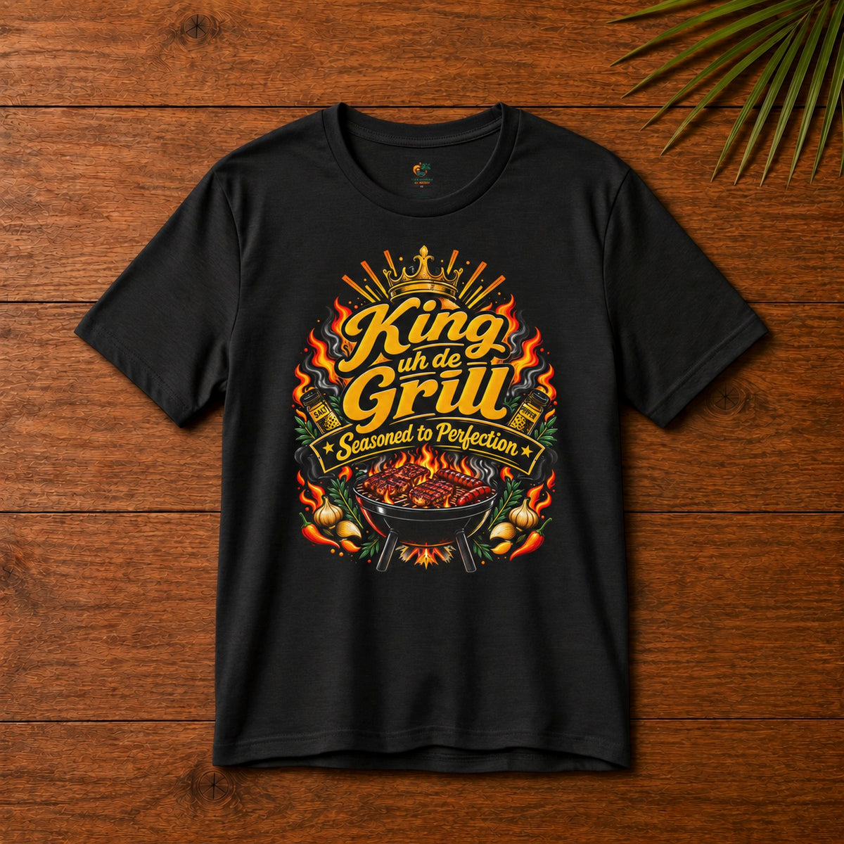 King uh de Grill Adult T-Shirt in black with Seasoned to Perfection grill graphic.